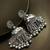 Silver toned drop earrings for women and girls