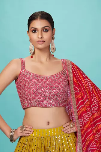 yellow georgette mirror embroidered work lehenga with pink blouse and dupatta