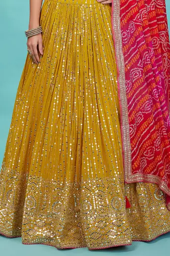 yellow georgette mirror embroidered work lehenga with pink blouse and dupatta