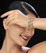 Gold finish red kundan bangles