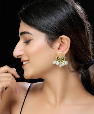 Gold finish white kundan studs 1