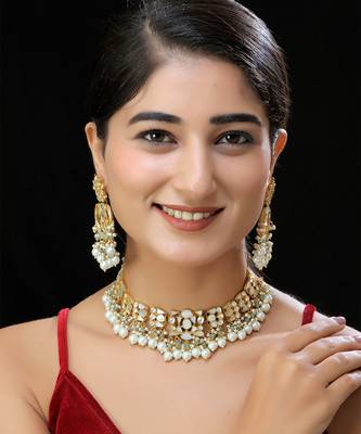 Gold finish kundan mother of pearls necklace set 1