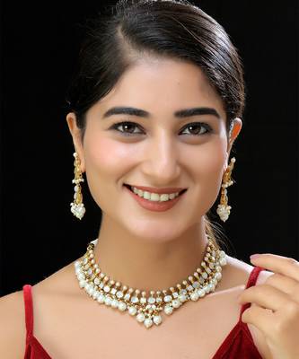 Gold finish kundan mother of pearls necklace set 1