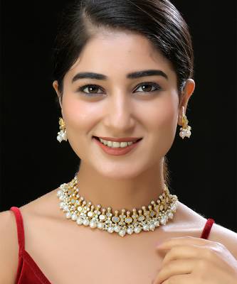 Gold finish kundan mother of pearls necklace set 1