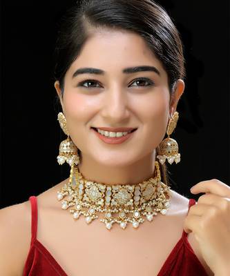 Gold finish kundan mother of pearls necklace set 1