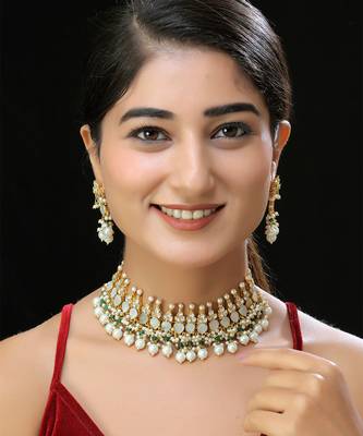 Gold finish kundan mother of pearls necklace set 1