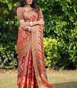 Rangkat Pumpkin Orange Leheriya Design Faux Banarasi Organza Saree