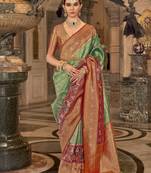 Elora Soft Silk Faux Banarasi Brocade Zari Woven Saree For Women Green  