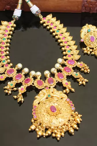Gold platted ruby peacock necklace set
