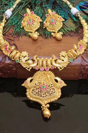 Gold platted ruby peacock necklace set