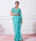 Sky blue mirror work net sarees with un stitched blouse