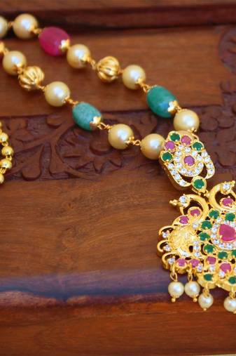 Gold platted peacock pearl necklace