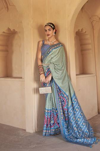Kimisha women's green silk patola saree with unstitched blouse piece