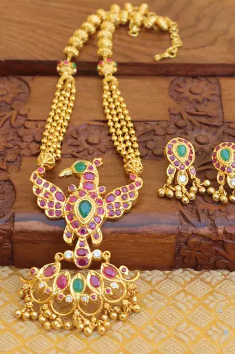 Gold platted ruby peacock long necklace with screw back earring