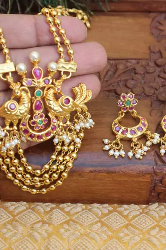 Gold platted ruby peacock long necklace with screw back earring