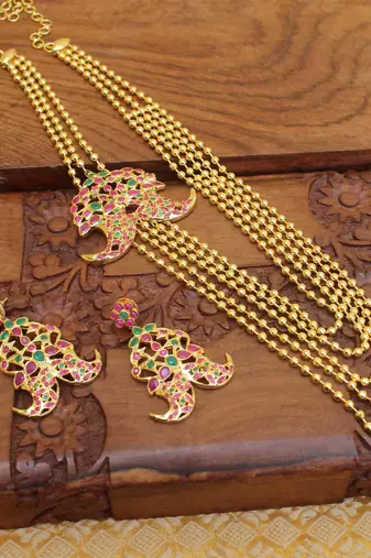 Gold platted ruby layered long necklace with screw back earring