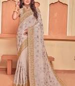 Dusty Beige Zari Embroidered Crepe Silk Party Wear Saree With Blouse Piece