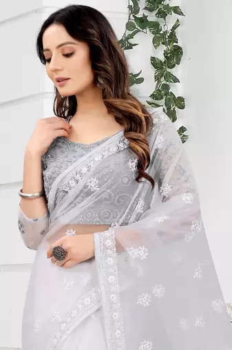 White Zari Embroidered Party Wear Net Saree With Blouse Piece
