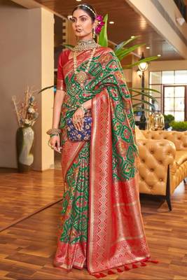 Lyuson  designer  patola with rich golden zari weaving pallu & border with designer  pure silk bloues 1