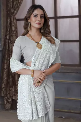 Off White Sequin Embroidered Border Georgette Wedding Saree With Blouse Piece