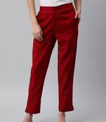 A maroon ankle length coton linen pant with plain belt in front.