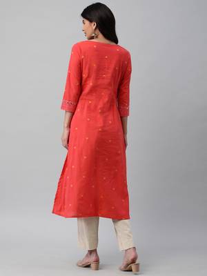 A line cotton weave kurta with delicate mirror work. 2