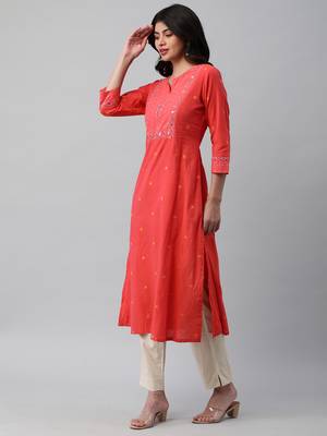 A line cotton weave kurta with delicate mirror work. 4