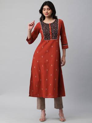 A line dobby kurta with a printed yoke highlighted with embroidery. 1