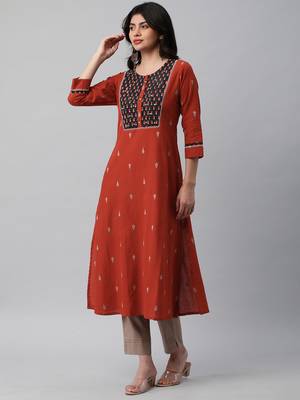A line dobby kurta with a printed yoke highlighted with embroidery. 4
