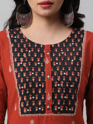 A line dobby kurta with a printed yoke highlighted with embroidery. 5