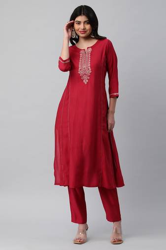 A line kurta in silk blend fabric with embroidery and zari lace detailling.