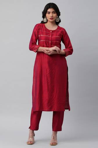 A visoce two colour fabric straight kurta with sequin embellishment.