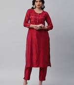 A visoce two colour fabric straight kurta with sequin embellishment.
