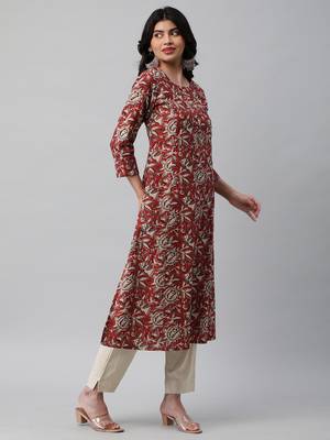 A line cotton printed kurta with center placket. 4