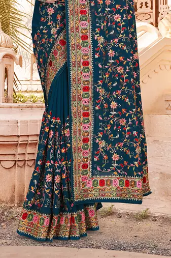 Teal Blue Kashmiri Resham Embroidered Border Georgette Party Wear Saree With Blouse Piece
