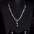 Silver plated pink stone embellished designer cz necklace 317fnnn348