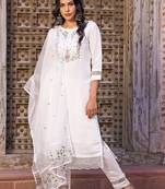 White colour fancy and girlish partywear embroidered party suit