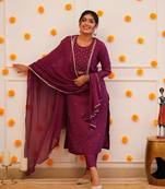 Wine colour fancy and sober embroidered salwar suit