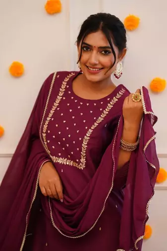 Wine colour fancy and sober embroidered salwar suit