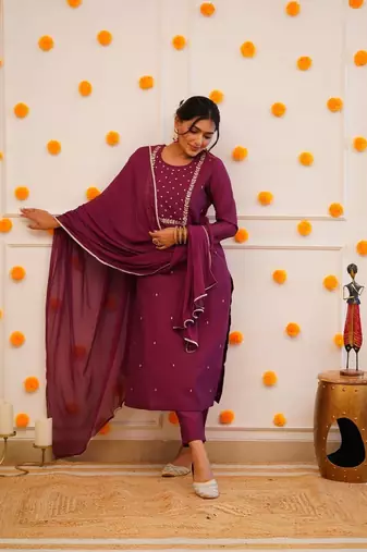 Wine colour fancy and sober embroidered salwar suit