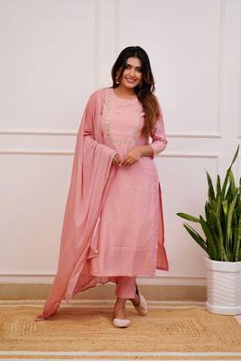 Peach colour fancy and sober embroidered salwar suit 1