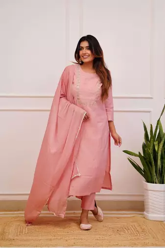 Peach colour fancy and sober embroidered salwar suit