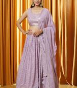 Lavender Sequience Embroidery Work Faux Georgette Fabric Flared Lehenga Choli With Dupatta.