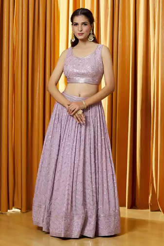 Lavender Sequience Embroidery Work Faux Georgette Fabric Flared Lehenga Choli With Dupatta.