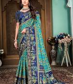 Sky blue and blue animal printed silk saree with lace border