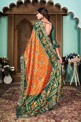 Orange and green animal printed silk saree with lace border 2