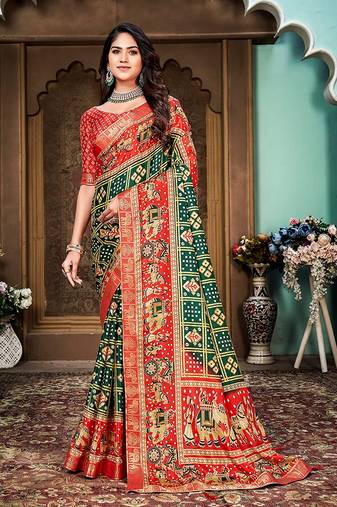Green and red animal printed silk saree with lace border