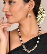 Sasha handmade pearl necklace and matching earrings set with white and black pearls