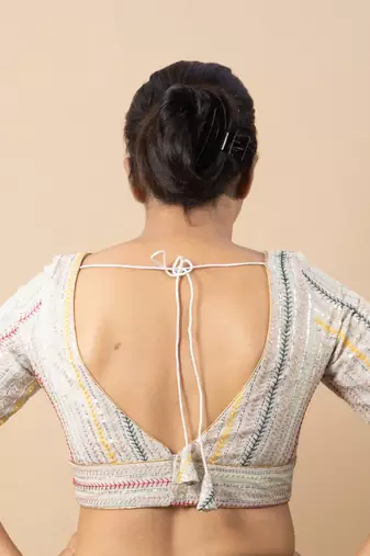 WHITE EMBROIDED GEORGETTE V NECK BLOUSE