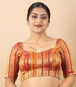 MUSTARD PRINTED BROCADE V NECK BLOUSE